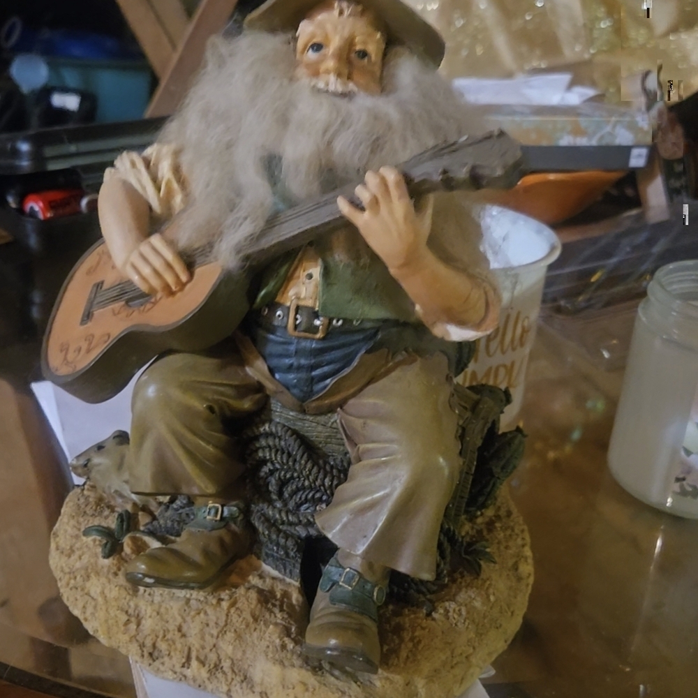 Rustic Musician Figurine with Guitar